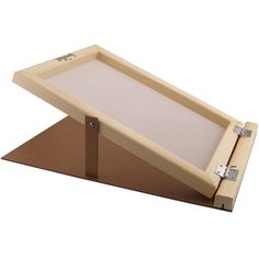 a wooden frame with a white board in it