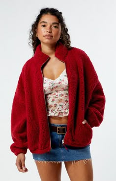 The Sherpa Cropped Zip Up Jacket from PacSun offers ultimate warmth and style for chilly days. Crafted from soft sherpa fabric, this oversized jacket features long sleeves, dropped shoulders, a stand-up collar, and convenient side hand pockets, with a full zipper front closure for a cozy yet trendy look.Soft sherpa fabricLong sleevesDropped shouldersStand-up collarSide hand pocketsFull zipper front closureOversized fit100% polyesterMachine washableModel is wearing a size XS/S PacSun Womens Sherp Cabin Fits, Cute Jackets For Women, Vintage Jacket Outfit, Red Zip Up Jacket, Cropped Zip Up Jacket, Womens Sherpa, Sherpa Fabric, Outfit 90s, Cropped Zip Up