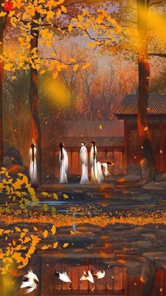 three women in white dresses are walking through the park with autumn leaves on the ground