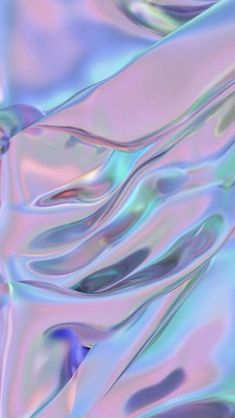 an abstract image of blue and pink waves in the water, as seen from above