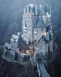 an aerial view of a castle at night