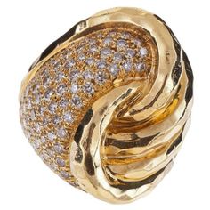 Henry Dunay ring composed of 18K yellow gold with pavé round brilliant-cut diamonds. The ring features a hammered finish. There are 99 round brilliant-cut diamonds that total 2.22 carats, F-G color and VVS-VS clarity. The ring is a size 6 1/2. Hammered Gold Ring, Square Diamond Rings, Tanzanite Diamond Ring, Bold Rings, Vintage Style Rings, Pave Diamond Ring, Textured Ring, Vs Diamond, Gold Ring Sets