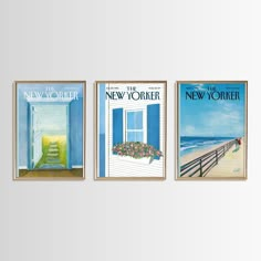 three new york posters are hanging on the wall next to each other in front of an open window