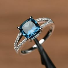 London blue topaz ring cushion cut gemstone promise sterling silver ring blue gemstone ring Elegant Rings, Blue Gemstone Rings, Ring Cushion, Cushion Cut Ring, Gold Diamond Wedding Band, London Blue Topaz Ring, Engagement Ring White Gold, Morganite Engagement Ring, Rose Engagement Ring