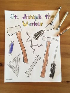 a piece of paper that says, st joseph the worker with tools on it and two pencils next to it