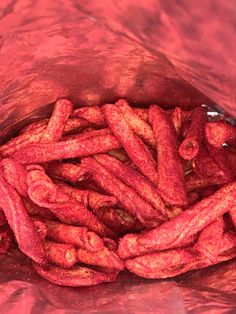 a bag filled with lots of red food