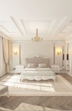 a bedroom with white furniture and chandelier on the ceiling is shown in this image