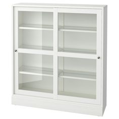 a white bookcase with glass doors and shelves