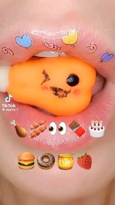 a woman's mouth with an assortment of food on the lip and eyes painted onto it