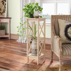 a living room scene with focus on the chair and side table in the foreground