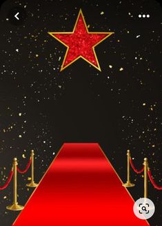 a red carpet with gold poles and a star on top