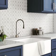 White Farmhouse Kitchen with Blue Cabinet Paint and Marble Tile Backsplash Shell Backsplash, White Marble Shower, Decorative Floor Tile, Farmhouse Kitchen Backsplash, Shell Tiles, Pearl Tile, White Marble Tiles