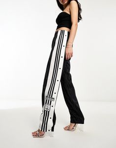 Wide Leg Trousers by adidas Originals Lower-half looks High rise Elasticated waistband Functional pockets Press-stud sides Regular, tapered fit Wide Leg Adidas Pants Outfit, Black Adidas Pants Outfits, Adidas Trousers Outfit, Adibreak Pants Outfit, Adibreak Track Pants, Adidas Originals Outfit, Adidas Pants Women, Adidas Trousers