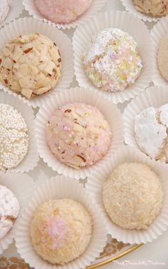 there are many different types of pastries in the paper plate on the table together