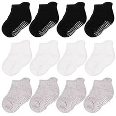 These socks are designed with anti-skid grips, which are customized round dotted grippers on the bottom. They are made of eco-friendly rubber in different sizes, with smaller ones on the edges and bigger ones in the middle. This design efficiently supports active boys and girls as they walk or crawl on the floor, play on the slide or trampoline, or run around the house. The socks also feature smooth heel tabs around the ankle cuff, making them easy to put on and take off. They provide a smooth f Style Socks, Non Slip Socks, Toddler Socks, Cat Socks, Girls Black, Baby Socks, Designer Socks, Ankle Socks, Kids Safe