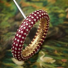 A timeless classic, our paver bangles, we do them in all the colors, red blue green yellow all white... #timeless #classics #ruby #bangle #jaipurgems Latest Jewellery Designs, Ruby Bangles, Classic Bangles, Pearl Necklace Designs, Stone Bangle, Gold Fashion Necklace