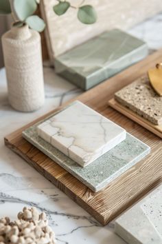 marble coasters and other decorative items on a table