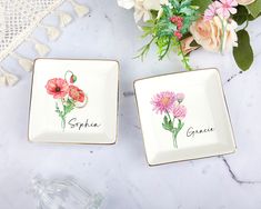 two personalized dishes with flowers on them