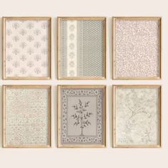 six framed wall hangings with different patterns and designs on the sides, all in various colors