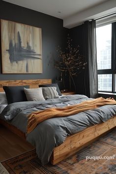 a large bed sitting in the middle of a bedroom next to a window with curtains