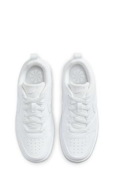 Retro court design brings modern street attitude to a low-top sneaker set on a grippy sole that scores comfort points for kids. Leather and textile upper/textile lining/synthetic sole Imported White Tennis Shoes, Nike Kids, White Sneakers, Tennis Shoes, Kid Shoes, Low Top, Nordstrom Rack, Tennis, Nordstrom