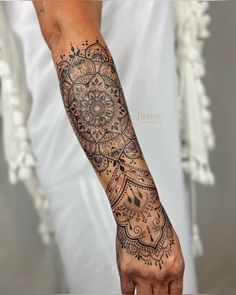 a person with a tattoo on their arm