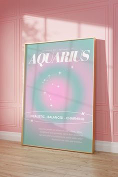 a pink room with a large aquarius poster on the wall and wood flooring