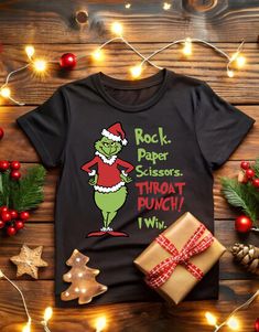 Rock Paper Scissors Grinch Christmas T-shirt, Grinch Xmas Funny T-shirt, Vintage Holiday Gift, Retro Xmas Shirt, Funny Grinch Unisex Tee Top How To Order Select Your Size and Color from the listing and place an order SPECIFICATION: Sizes: Kids Size 3/4=24-26,5/6=26-28,7/8=28-30,9/10=30-32,11/13=32-34 Adult Size S-38-40,M-40-42,L-42-44,XL-44-46,2XL-46-48,3XL-50-52,4XL-52-54 SPECIFICATION: 50% Polyester 50% Cotton Reactive Dyed Lycra Ribbed Cuffs & Welt Twin Needle Stitching Taped Neck Front Pouch Grinch Tshirt Vinyl, Diy Grinch Shirt, Grinch Clothes, Funny Grinch, Xmas Funny, Grinch Shirts, Rock Paper Scissors, Xmas Shirts, Paper Scissors