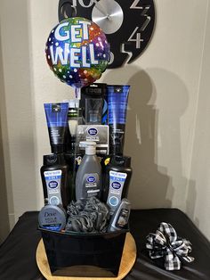 a birthday gift basket is displayed on a table