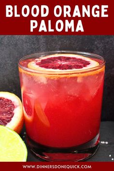 blood orange paloma cocktail in a glass with grapefruit