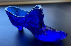 Get this pretty, blue, vintage Fenton slipper/shoe. Miniature collectible clear dark blue glass. Looks so pretty anywhere in the home. Also makes a great gift! Excellent condition please see photos for all details. Free shipping as always, and thank you for looking. Glass Shoes, Cobalt Glass, Glass Slipper, Slipper Shoes, Blue Vintage, Blue Glass, Glass Collection, Cobalt, Dark Blue