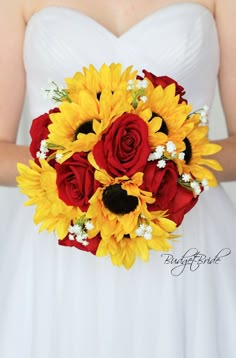 a bridal bouquet with sunflowers and red roses in the bride's bouquet