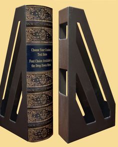 a bookend with two books on it sitting next to each other in front of a yellow background