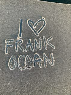 i love frang ocean written in chalk on the sidewalk with words drawn below it