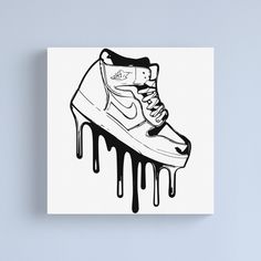 a black and white drawing of a shoe with dripping paint on the bottom canvas print