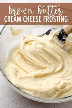 a glass bowl filled with cream cheese frosting