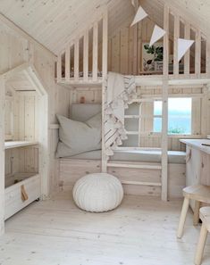 an instagram photo of a room with wooden walls and white furniture, including a loft bed