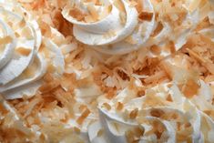 whipped cream and coconut flakes are mixed together