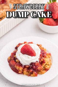 strawberry dump cake on a white plate with whipped cream and strawberries in the background