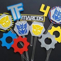 some paper cut outs are sitting on top of each other, with the word'tf maros written above them