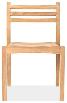 a wooden chair sitting on top of a white floor