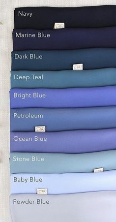 the colors of marine blue, deep blue, deep purple and white sheets are arranged on top of each other