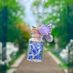 Natural Lavender Seeds (Dark Purple Color) In Small Glass Jar With Cork Stopper. 11mm (L) X 18 Mm (H) Amethyst Crystal Bead 6mm Diameter Eco Friendly Alloy Butterfly With Silver Antique Finish Rollo Chain, Stainless Steel 20” + 2” Extension Purple Birth Flower Necklace For Gift, Lavender Sterling Silver Healing Necklace, Lavender Sterling Silver Necklace For Healing, Handmade Purple Necklace For Keepsake, Bendable Necklace, Jar Necklace, Lavender Seeds, Dark Purple Color, Small Glass Jars