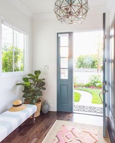 an instagramted photo of a front door and entryway