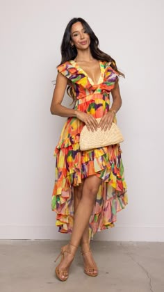 Features: High to Low Maxi Skirt V Neck Summer Print Vibrant Colors Model is wearing a small 82134 H3-1 Cocktail Chic, White Dress Top, Havana Nights, Jumpsuit And Blazer, Frock Dress, Ruffled Maxi Dress, Asymmetrical Design, Summer Skirts, Floral Dress Black