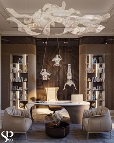 an elegant living room with chandelier, chairs and table in the middle of it