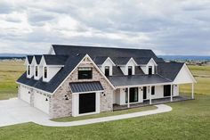 an aerial view of a house in the country