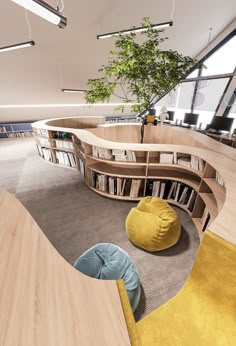 a library with bookshelves and bean bags on the floor