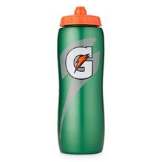 the gatorade water bottle has an orange lid and is green with a grey g on it