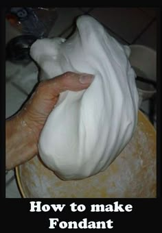 a hand holding a cloth over a bowl with white substance in it and the words how to make fondant